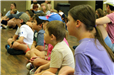 children listening to presentation