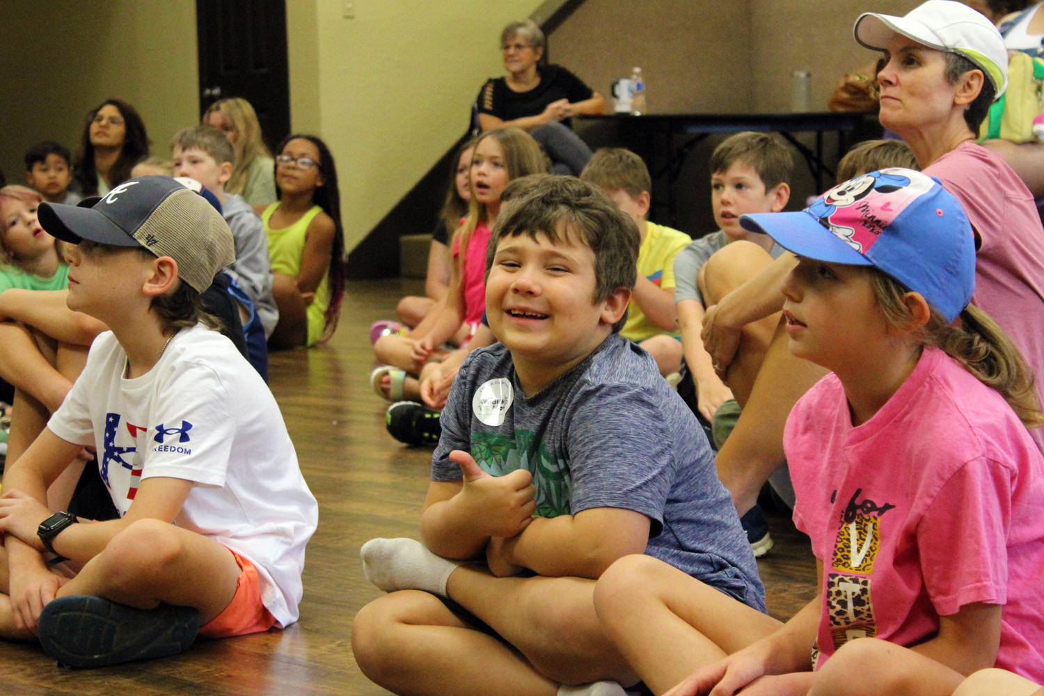 Young boy smiling during the presentation